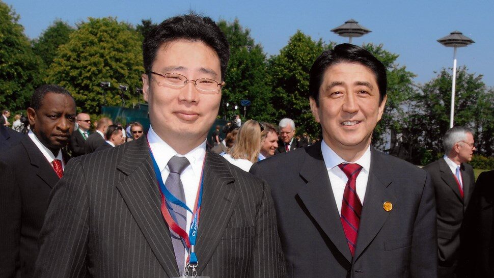 japan issue_Abenomics The Sequel_Daiuke Tsuchiya with PM Shinzo Abe