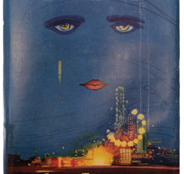 Blue book cover illustration featuring a large disembodied face with golden eyes and red lips floating above a glowing city skyline with bright lights and fireworks-like bursts.