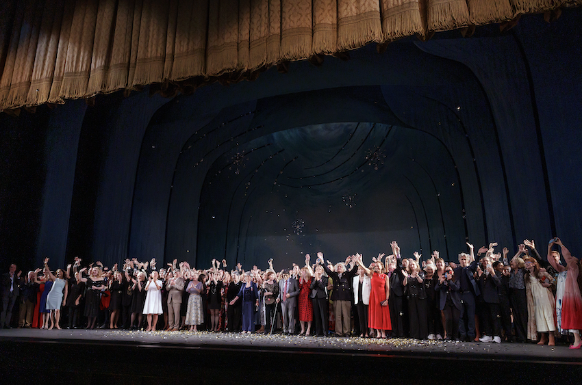 A photograph of more than 300 NYCB dancers, past and present, taking a bow on stage to celebrate the company’s 75th anniversary after the opening show of the season.