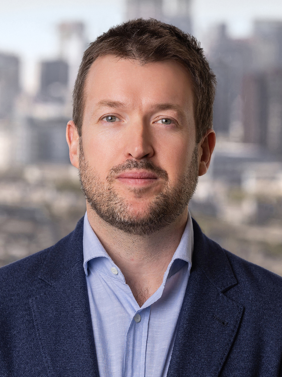 Headshot of Ash Spiegelberg