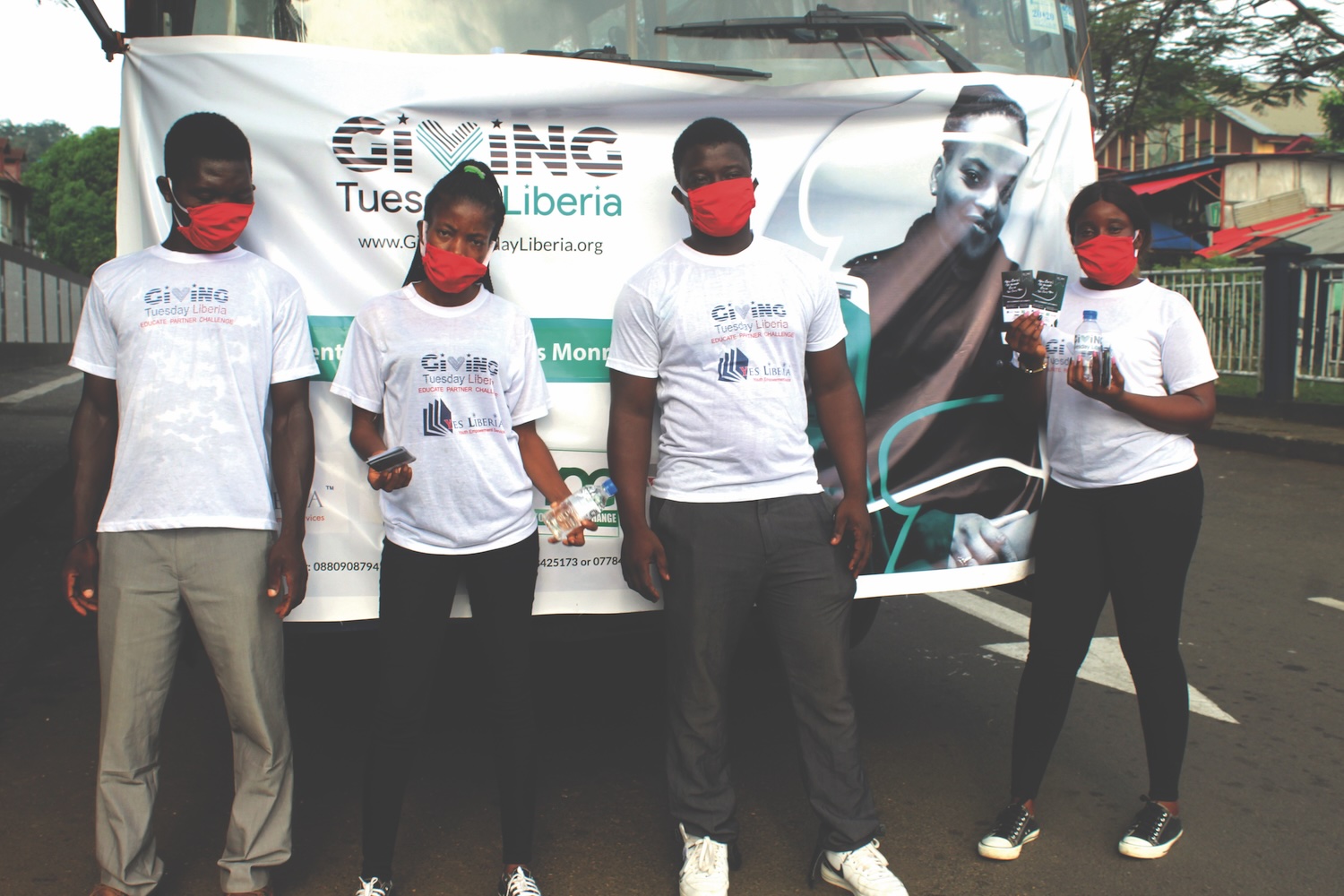 Volunteers in Liberia sport T-shirts adapted for the country’s Giving Tuesday event during the pandemic. 