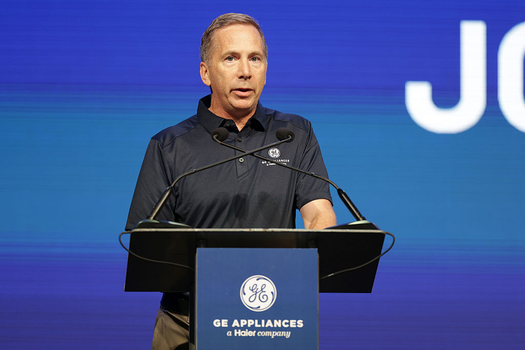 A photograph of Kevin Nolan, President and CEO, GE Appliances speaking onstage in front of a podium at GE Appliances on August 13, 2025 in Louisville, Kentucky.