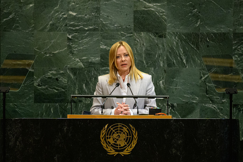 Italian Council of Ministers President Giorgia Meloni speaks at the 80th session of the UN’s General Assembly (UNGA) on September 24, 2025 in New York City. A woman speaking at at a podium with the UN crest. Behind her, a green marble tiled wall.
